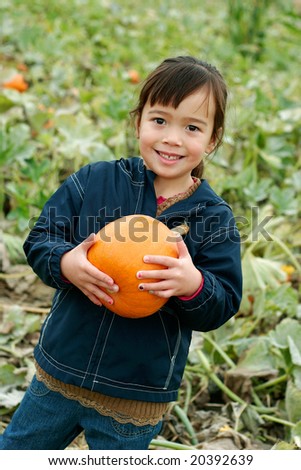 Holding A Pumpkin