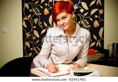 Female sales assistant in clothing store