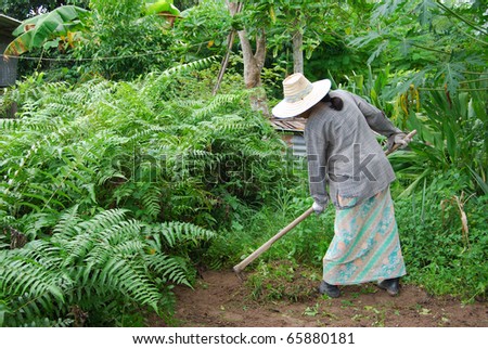 A woman work in garden.