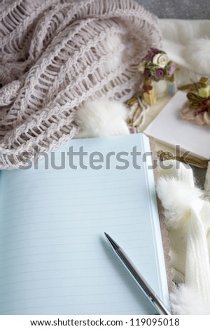 open blank note book with pen for writing