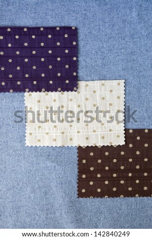 three pieces of three color polka dots fabric