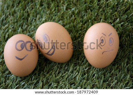 envy egg face with happy couple faces eggs
