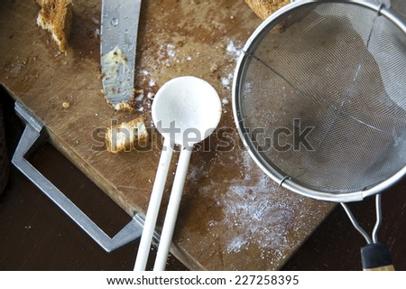 messy cooking on wooden cutting board