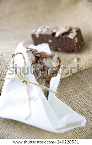 close up nut brownie wrapping put on sackcloth background