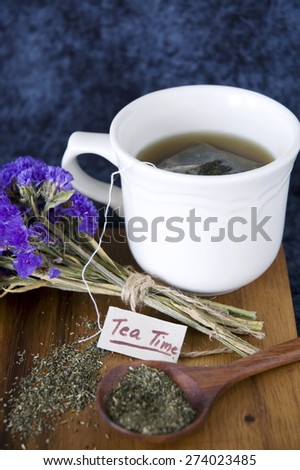 tea time tag with tea cup and dried tea on spoon