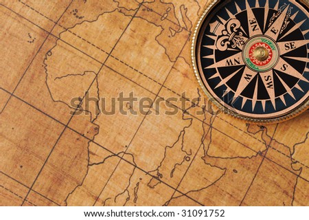 Old compass and map background