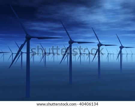 Wind power stations. Early morning, a fog. A dark blue tonality