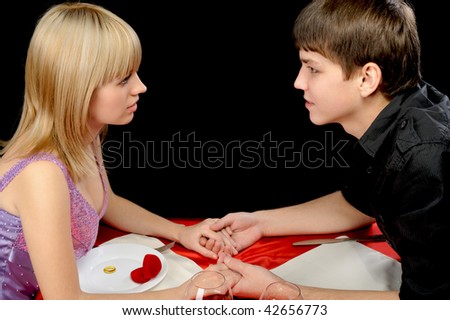 Romantic supper. Young the man proposal the offer to the girl