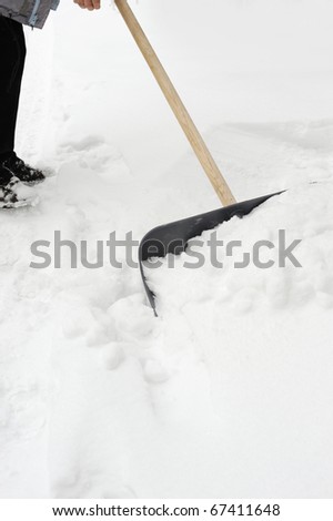 Cleaning of a snow. Clearing of road to winter time by means of a shovel