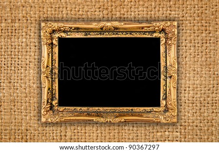 Gold frame on brown fabric background. Hi resolution photo real material and frame.