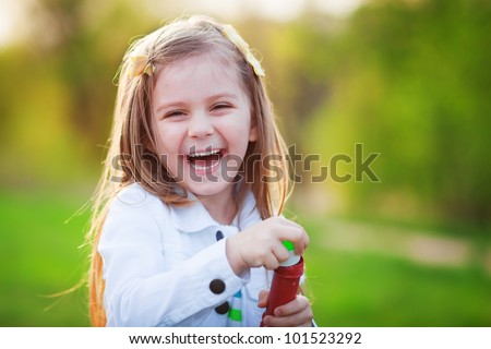 Summer portrait of happy cute child