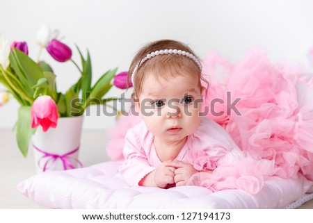 Angelic baby in pink petty