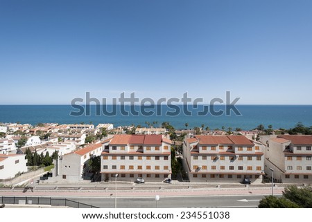 Views of Santa Pola town with Tabarca islet at the background. It is a coastal town located in the comarca of Baix Vinalopo, in the Valencian Community, Alicante, Spain, by de Mediterranean Sea