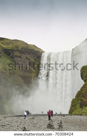 Skogafoss waterfall. It is a waterfall situated in the south of Iceland. It is one of the biggest waterfalls in the country with a width of 25 meters and a drop of 60 m