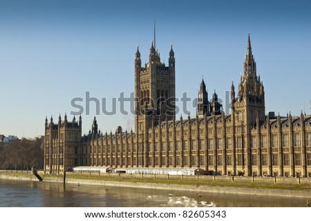 Palace of Westminster, London. It is the meeting place of the two houses of the Parliament of the United Kingdom. It lies on the north bank of the River Thames.