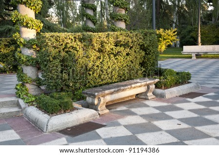Stone bench. Stone bench in Cecilio Rodriguez gardens, Retiro Park, Madrid, Spain