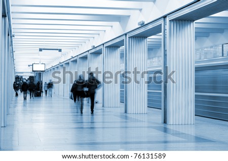 Metro station and passengers