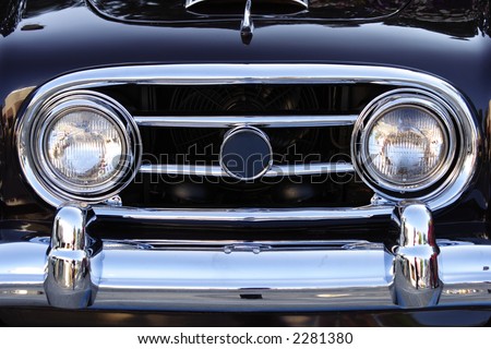 stock photo Grill of a shiny black classic car