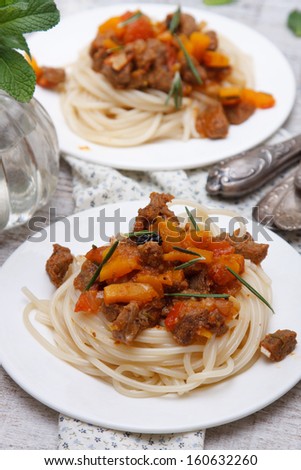 Spaghetti with meat and pumpkins