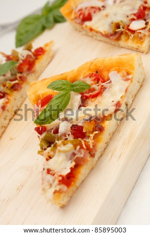 Italian pizza with tomato, parmesan and green pepper