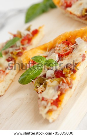 Italian pizza with tomato, parmesan and green pepper