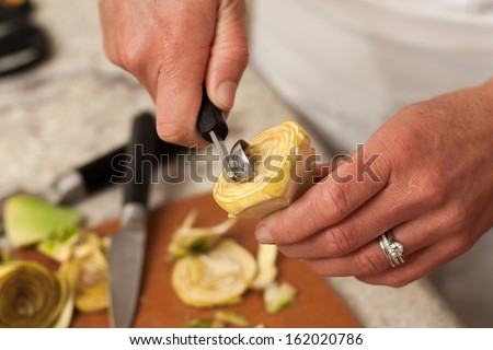 Gourmet chef preparing Artichoke hearts