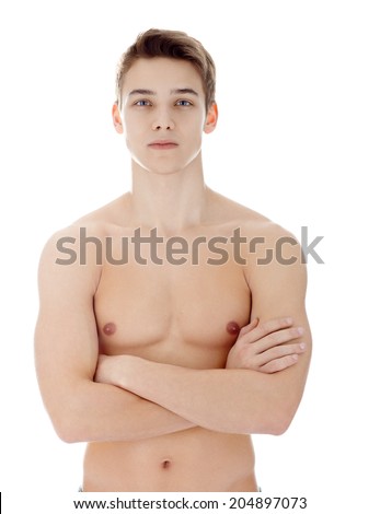 Portrait of young man with nude torso his arms crossed isolated on white background