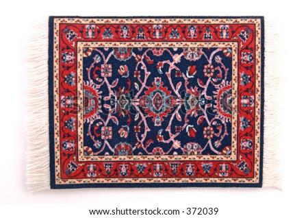 A miniature Persian rug. (isolated, 12MP camera)
