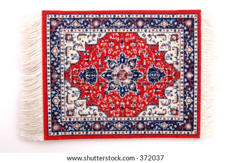 A miniature Persian rug. (isolated, 12MP camera)