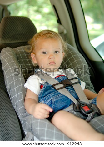 Baby boy in a car seat for safety. Focus = face. (12MP camera, Model Released.)