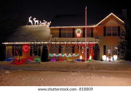 A house decorated with Christmas lights. 12MP camera.