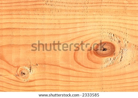 Macro detail of a 2x4 pine board lumber.