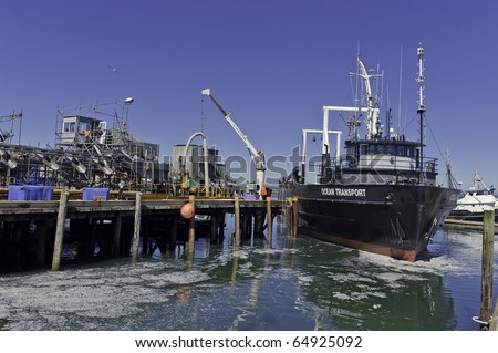 WESTPORT, WA - AUGUST 24: A fishing trawler docks in the Port of Grays Harbor, Washington State on August 24, 2010 in Wesport, WA. It is the number one seafood landing point in Washington State.