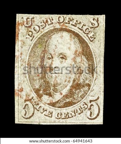 UNITED STATES of AMERICA - CIRCA 1847: A rare first stamp of the United States of America which honors  Benjamin Franklin, the first Postmaster General of the United States, circa 1847.