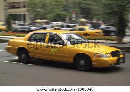 stock photo Moving Taxi Cab
