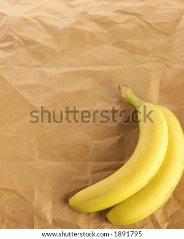Yellow bananas on brown bag