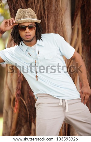 Fashionable young man in nature