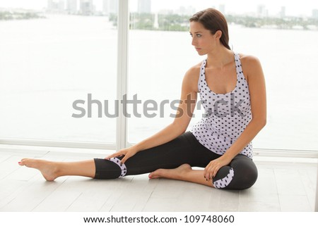 Stock image of a woman stretching