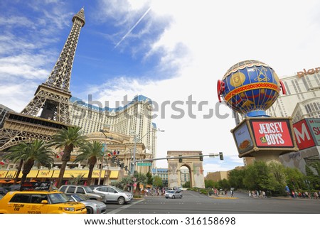 LAS VEGAS - AUGUST 7: Image of the strip at Las Vegas which is the famous main road where tourists walk amoung casinos, hotels and  upscale shops August 7, 2015 in Las Vegas NV
