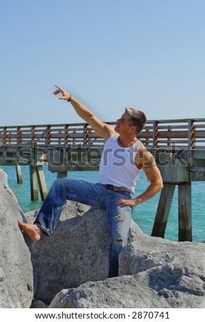 Man pointing at the sky