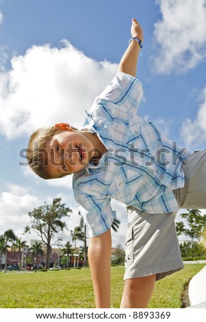 Boy stretching arms out