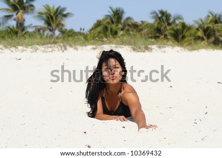 Woman Reaching out on the Sand