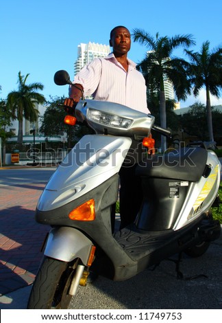 Businessman opting for a scooter