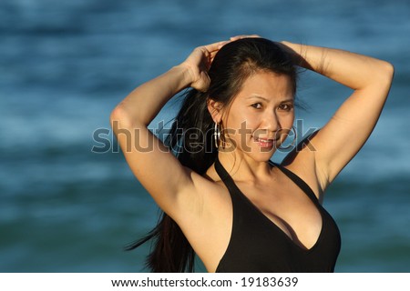 Woman pulling up her hair