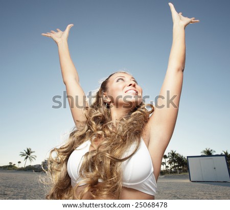 Woman extending her arms in the air