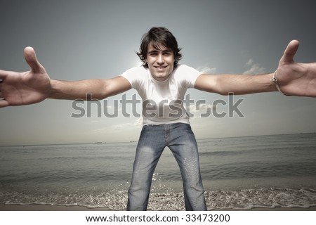 Man reaching out for the camera