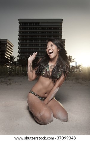 Woman in a bikini with a big smile