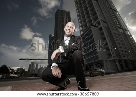Unusual perspective of a man in a tux in the city