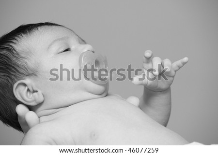Cute baby with a pacifier