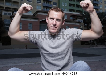 Man flexing his strong arms